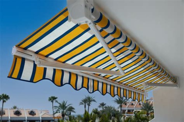 Can a retractable awning be installed on an overhang?