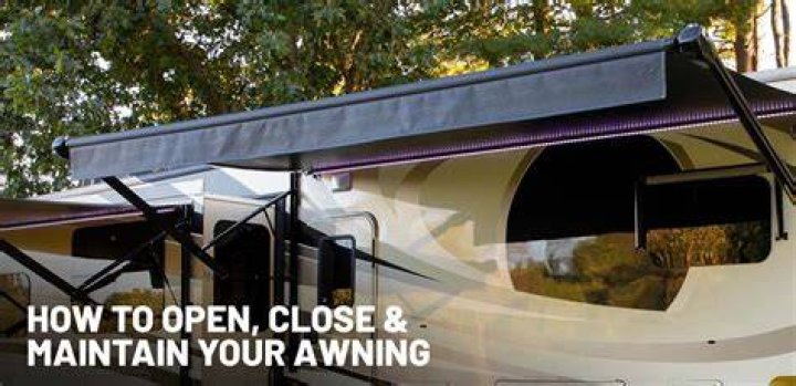 How do you close a Dometic power awning manually?