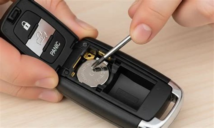 How do you replace the battery in a key fob?